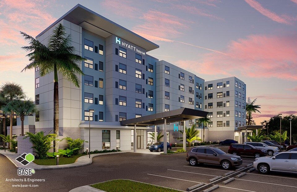 Twilight view of the modern Hyatt House Hotel with illuminated signage, showcasing the sleek architectural design and vibrant landscaping, emphasizing BASE4's innovative construction and design solutions.