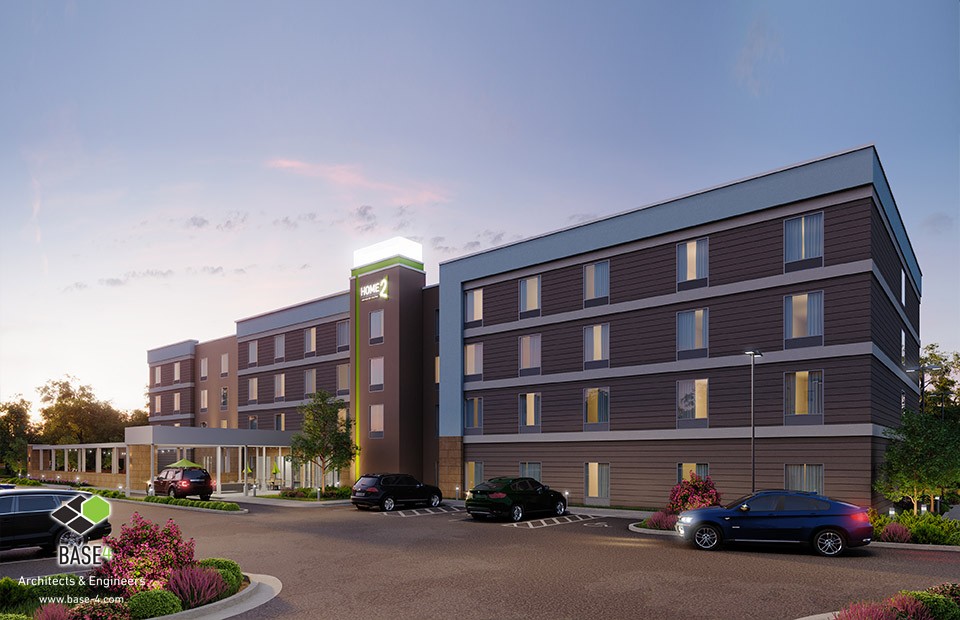 Twilight view of Home2 Suites by Hilton, designed by BASE4, featuring modern architecture with warm lighting and inviting landscaping, emphasizing comfort and style in extended-stay accommodations.