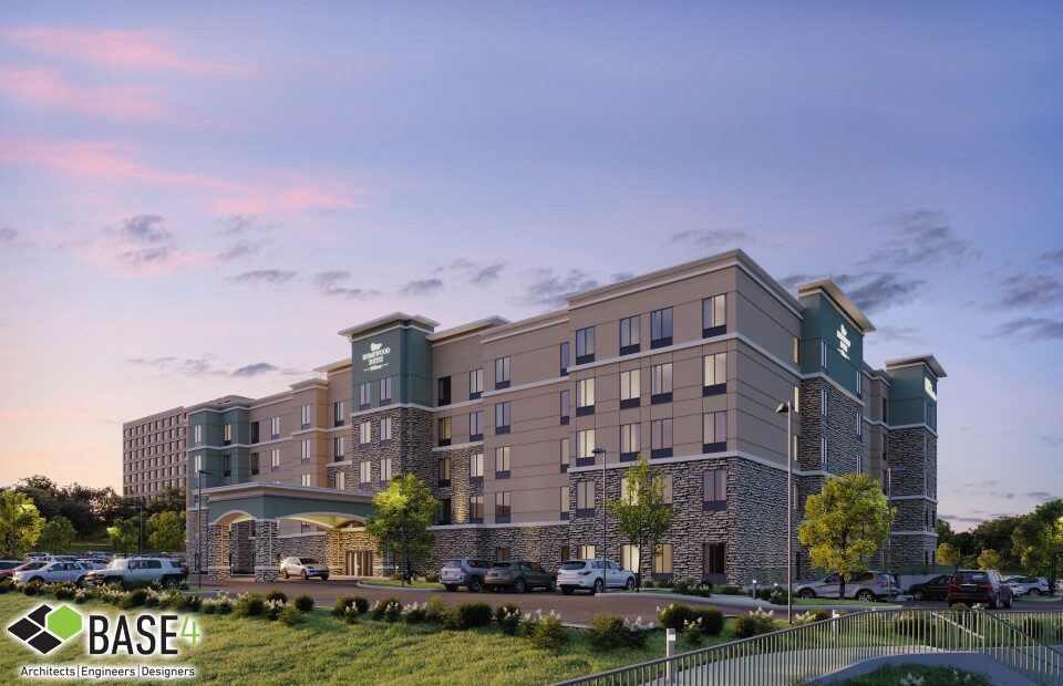 DUAL HOMEWOOD SUITES & HILTON GARDEN INN hotel showcasing modern design, parking, highlighting the hotel's appealing architecture.