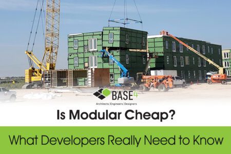 Modular building modules being lifted by crane during offsite construction assembly.