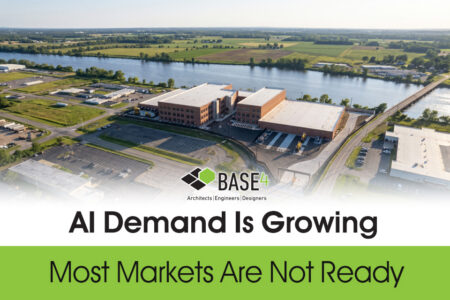 Aerial view of a large data center campus near water with BASE4 branding and the headline AI demand is growing.