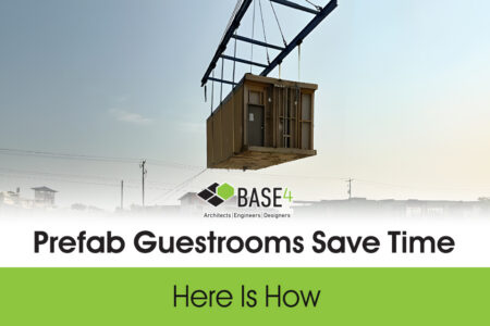 Prefab hotel guestroom module being lifted by a crane for installation.